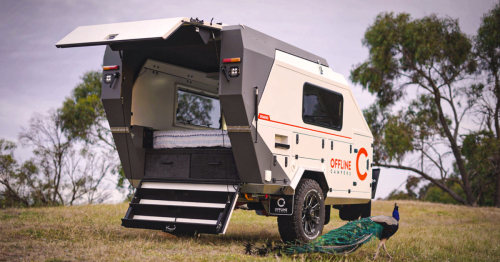 Offline squaredrop camping trailer deploys fold-out cafe and bathroom