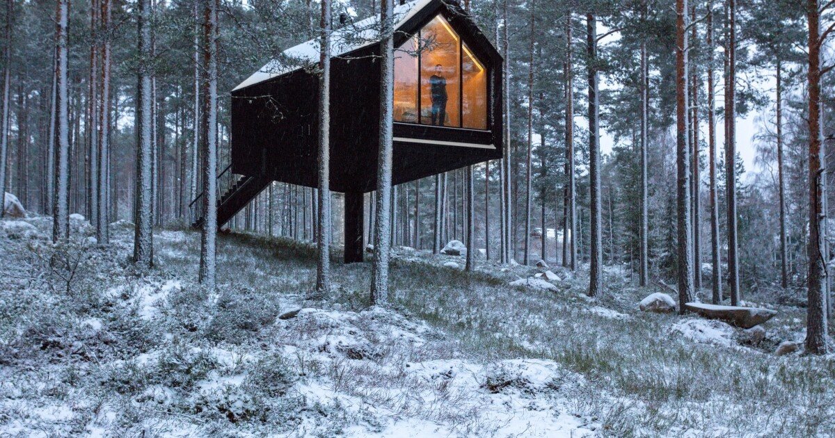 Tiny cabin balances on a single pillar in Finnish highlands