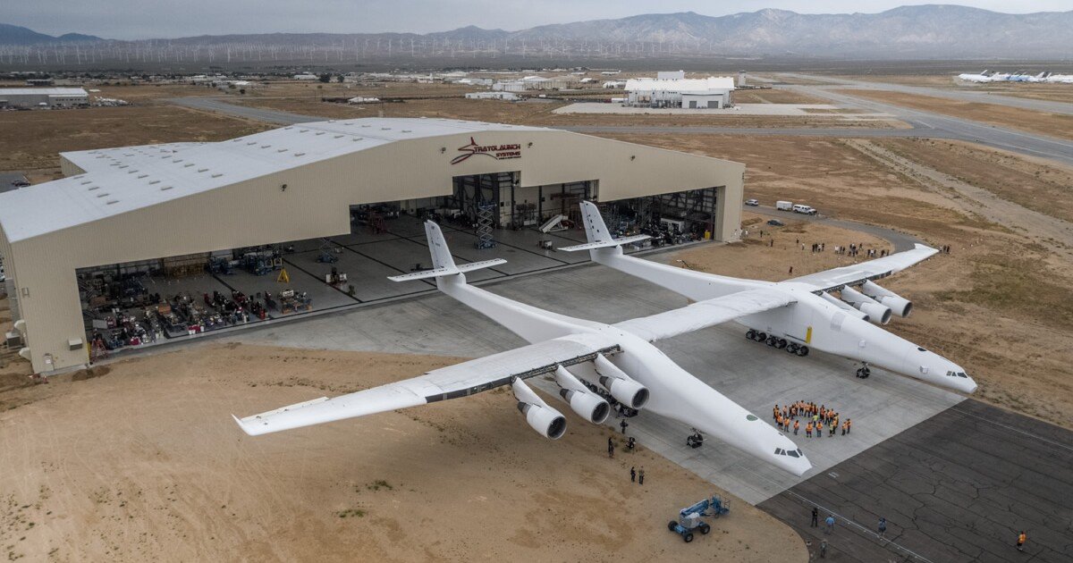 Stratolaunch, the world's largest plane, emerges from its hangar for the first time