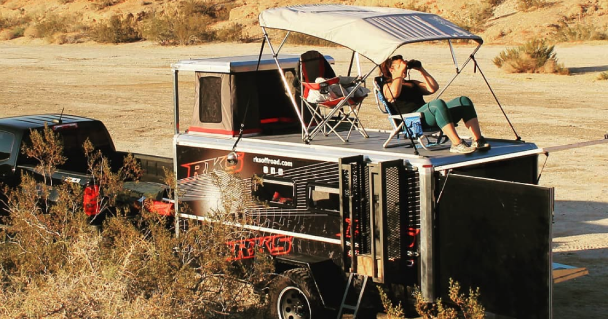 Wood-free pop-up camping trailer packs a rooftop party deck