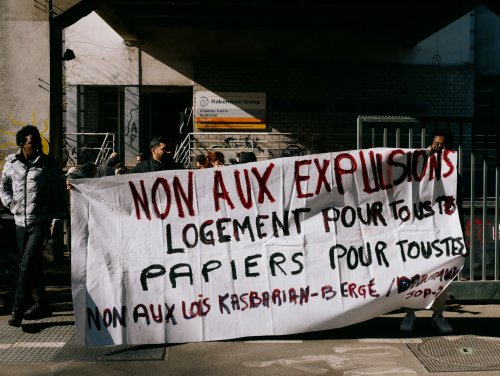 In the Shadow of Paris’ Olympic Village, Migrants Are Pushed Into the ...