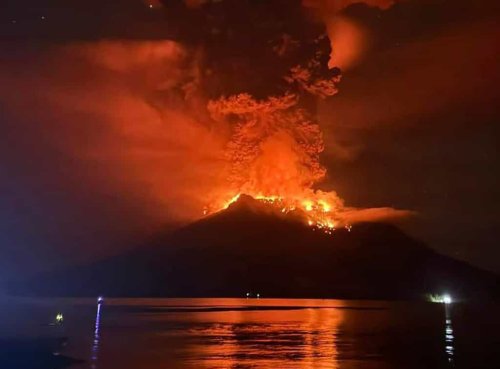 Thousands evacuated and tsunami alert issued after Indonesian volcano eruption