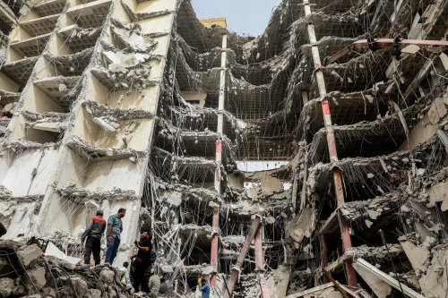Iran building collapse kills 14 as mayor and others detained