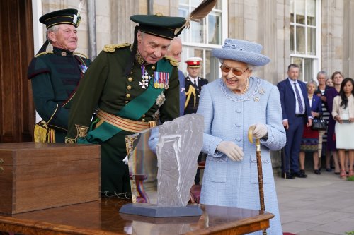 The Queen jokes with Duke of Buccleuch at Reddendo parade in Scotland