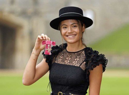 Emma Raducanu collects her MBE from King at Windsor Castle wearing Dior