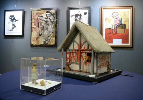 Model village owners laughing all the way to the Banksy after £1m sale