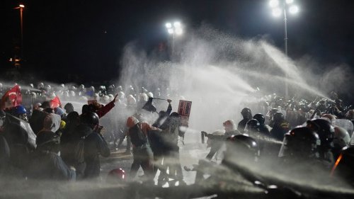 Turkey detains journalists as protests over the jailing of key Erdogan rival rock the country