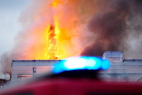 Fire Rages through the 17th-century Old Stock Exchange in Copenhagen and Its Spire Has Collapsed