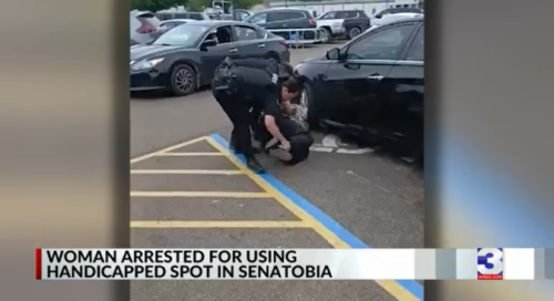 Woman says she was wrongfully arrested over handicap parking space