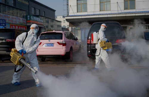 China's COVID Trauma Returns As Hazmat Workers Disinfect Streets