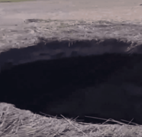 Mysterious 'Remarkably Round' Sinkhole in Field Stumps Russians: Video