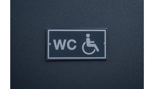 Miss Manners: If you don’t have a disability, is it ever okay to use a wheelchair-accessible stall?