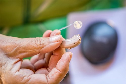 Navigating Aging: Using hearing aids can be frustrating for older adults, but necessary