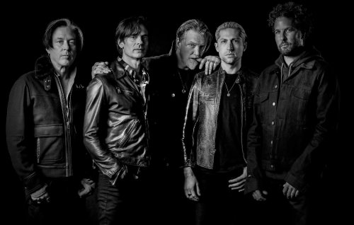 Queens Of The Stone Age tease ‘Alive In The Catacombs’ Paris live release