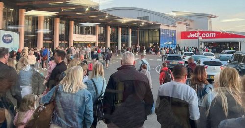 Bedlam at Leeds Bradford Airport as passengers wait in a 'half a mile queue'