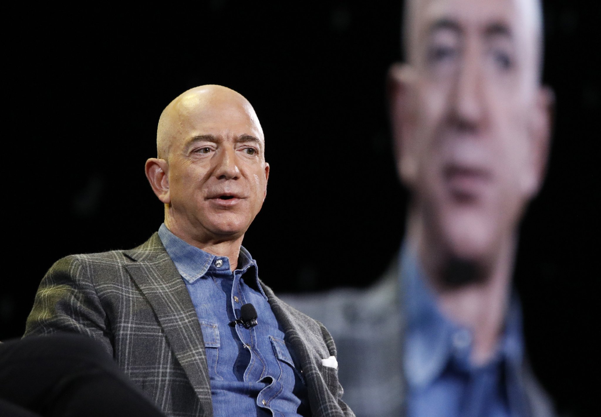 Jeff Bezos Built Amazon 27 Years Ago. He Now Steps Down As CEO At Critical Time