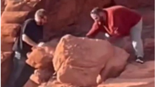 A video shows two men toppling rock formations at Lake Mead trail