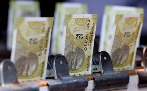 Rupee drops on hedging, portfolio outflow-spurred dollar bids