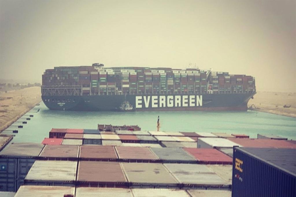 Massive container ship stuck in Suez Canal blocks trade