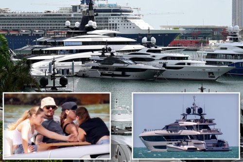 David and Victoria Beckham cuddle up before boarding lavish $20 million yacht in Miami