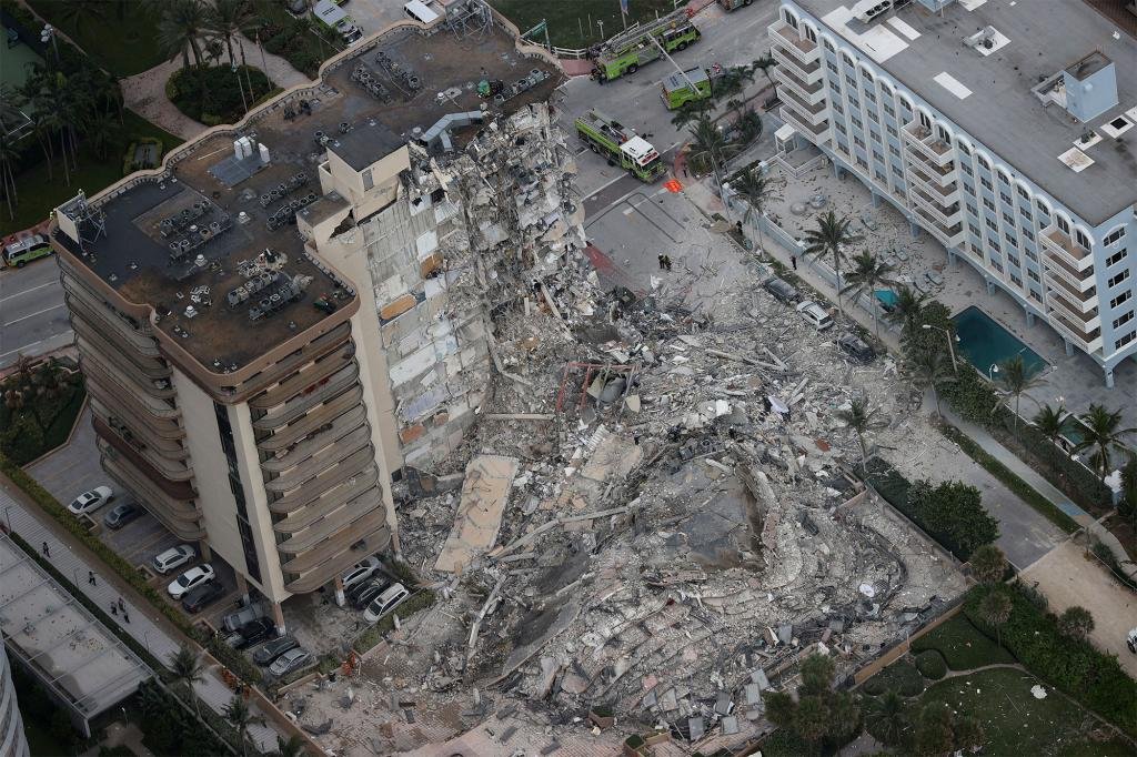 Security footage shows Florida condo being pelted with debris moments before collapse