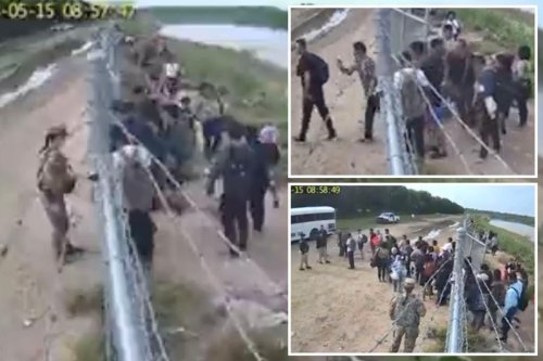 shocking-video-shows-us-soldier-appearing-to-let-migrants-onto-private