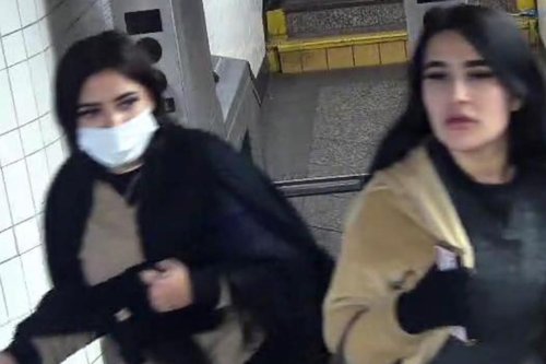 Stunning raven-haired duo rob woman on Brooklyn subway platform