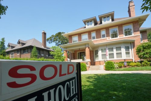 US existing home sales unexpectedly fall in June as house prices hit record high