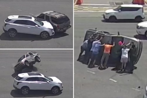 8 good Samaritans pull over, band together to flip over SUV and rescue driver after crash: dramatic video