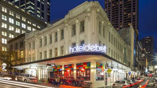 Who is buying 98-year-old Hotel DeBrett for $21m, what they plan
