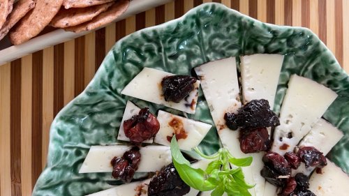 Recipe: Pair white cheddar with wine-soaked cherries and herbs