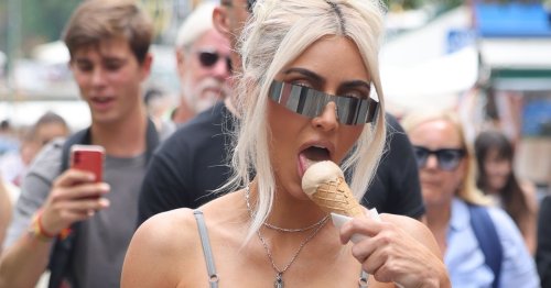 Kim Kardashian tucks into ice cream during stroll in Italy hours before Kourtney wedding