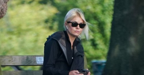 Holly Willoughby looks deep in thought on walk as 'cracks starting to show' with Phil