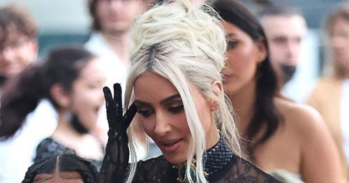 Kim Kardashian wows in black lace gown at Kourtney and Travis' wedding in Italy