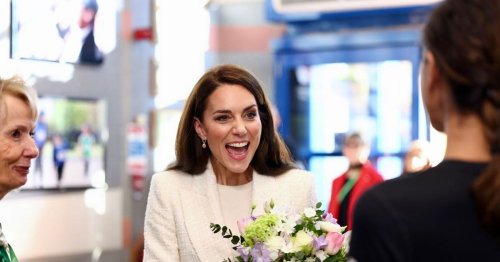 Beaming Kate Middleton is a modern Princess as she rocks trainers on school visit