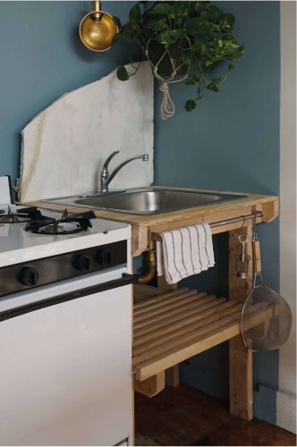A DIY Towel Rod for Kitchen Linens in Front of the Sink