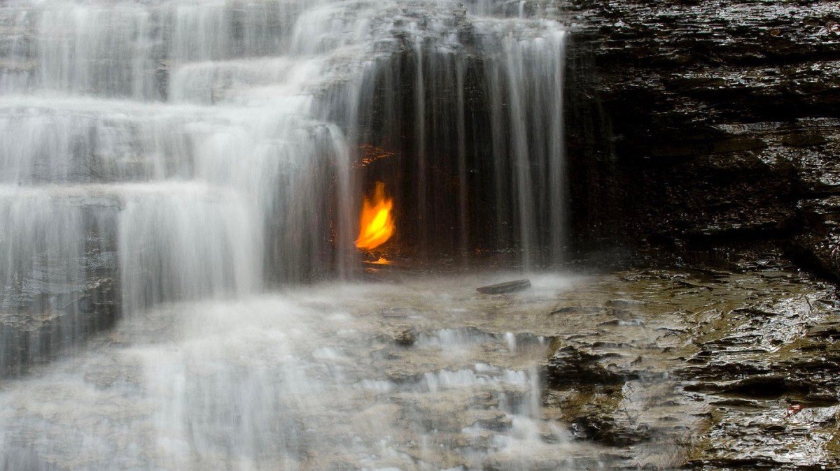 The Eternal Flame Burns Continuously Behind A Waterfall In New York [VIDEO]