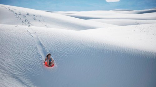 The Best Places to Slide Down Huge Sand Dunes in the U.S.