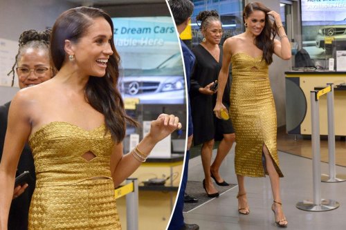 Meghan Markle makes royal entrance in gold dress as she’s honored at ...