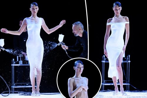 Bella Hadid gets dress spray-painted on mid-fashion show