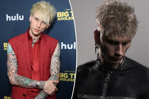 Machine Gun Kelly shows off wild new blackout tattoos covering his arms, chest and torso