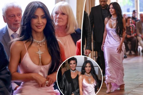 Kim Kardashian arrives in Paris in slinky slip dress for Victoria Beckham fashion show