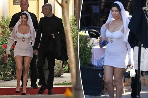 Kourtney Kardashian marries Travis Barker in short wedding dress: photos