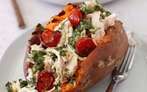 Chicken and Pesto-Stuffed Sweet Potatoes Are A Delicious Paleo Dinner