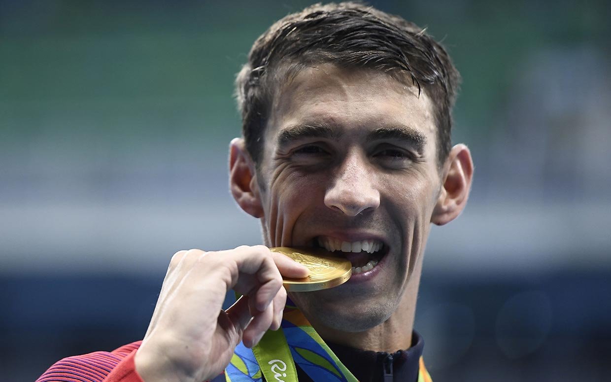Why Do Olympic Athletes Bite Their Gold Medals?