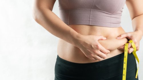 What Causes Belly Fat In Women? Doctors Break It Down
