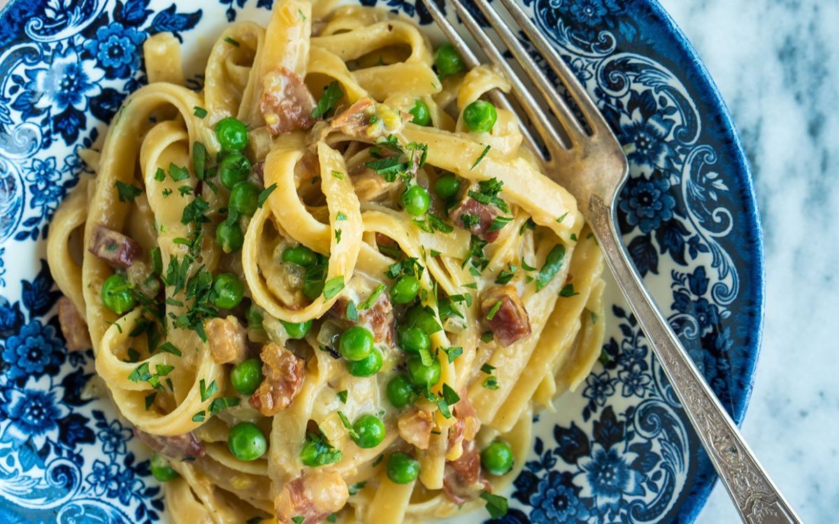 Stanley Tucci Shares His Recipe for Nico's Pasta With Prosciutto, Onions, Peas and Pancetta