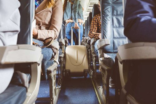 Woman Crosses Her Legs on an 8-Hour Flight, Preventing Man in Front of Her from Reclining Fully. Then He Gets Mad