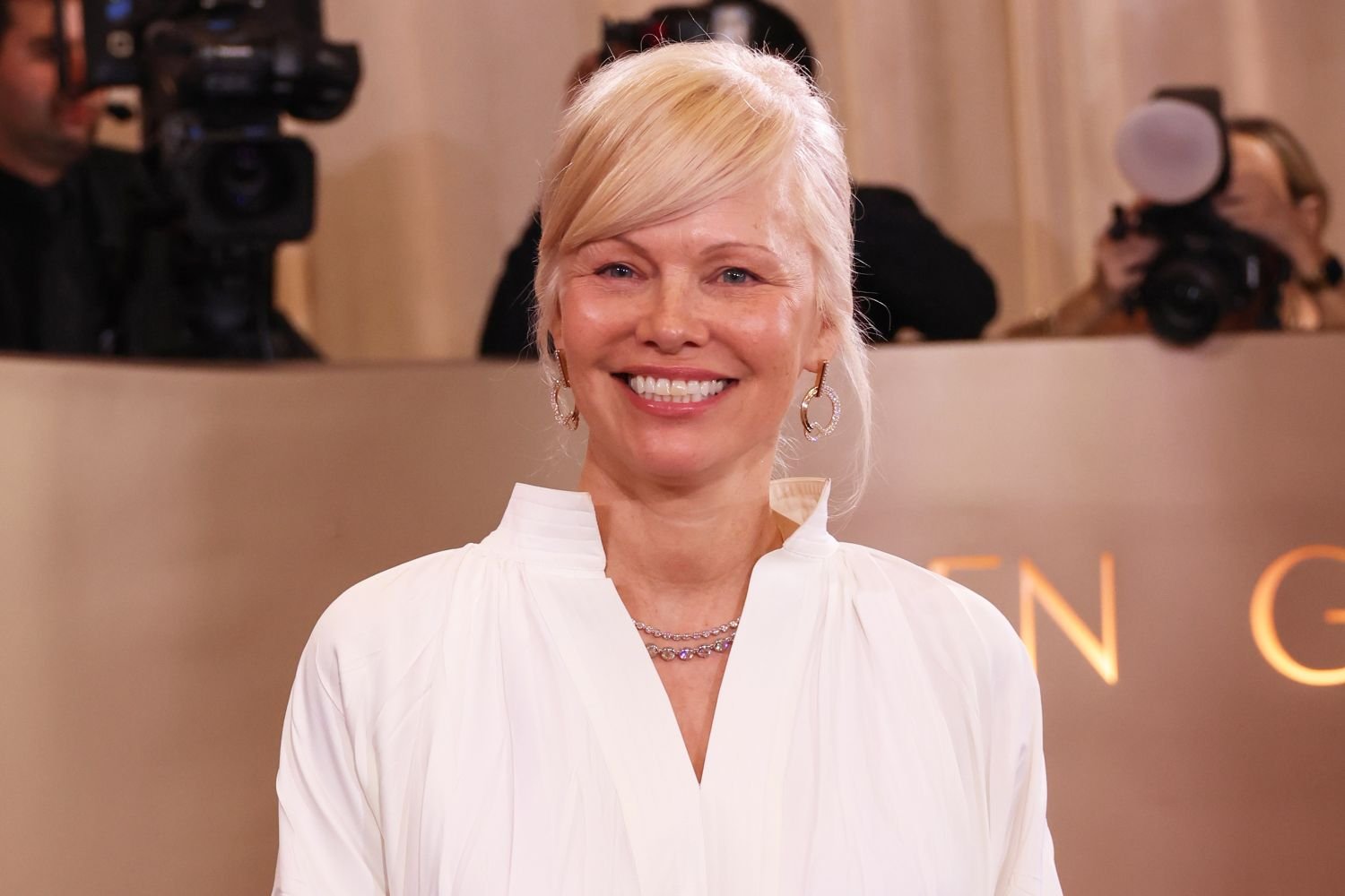 Pamela Anderson Wore the Breezy and Romantic Dress Style We’ll Be Taking with Us Into Fall — Shop Similar Pieces