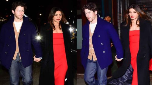 Priyanka Chopra styles red tube midi with classy trench coat on wedding anniversary date with Nick Jonas